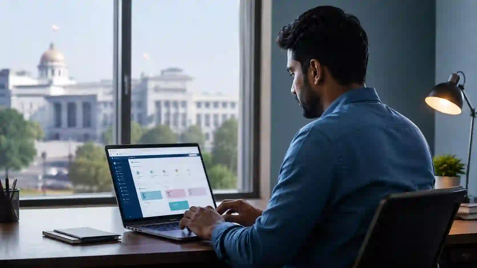 Government services — a person accessing public services online on a laptop